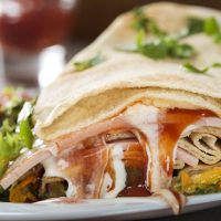 Sandwich or wrap filled with pork and beef meat